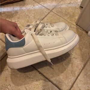 Blue and white sneakers
Size 8.5